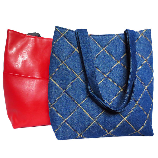 the anjelica 517 tote from Holland Cox with a bright red vinyl back