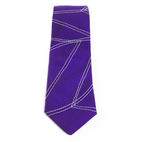 Cotton necktie in purple and gray, stitched with the Holland Cox signature chevron wave motif.