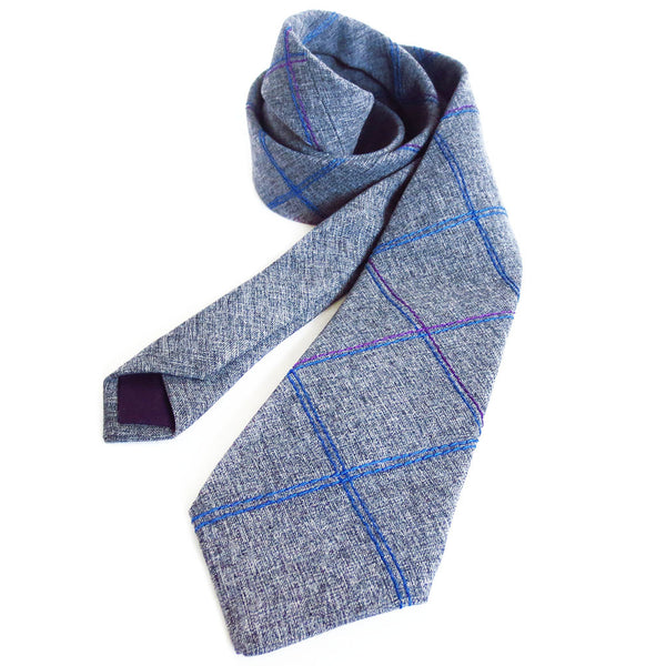 handmade necktie in wool/rayon blend suiting with purple and blue stitched details