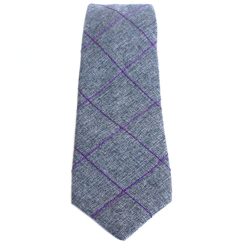 purple windowpane check stitched into gray wool blend suiting