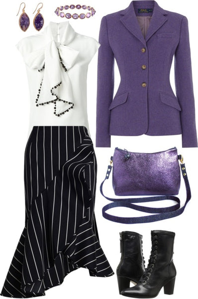 the reina crossbody bag styled for work, with a purple blazer, a pinstriped skirt, and a white ruffly top