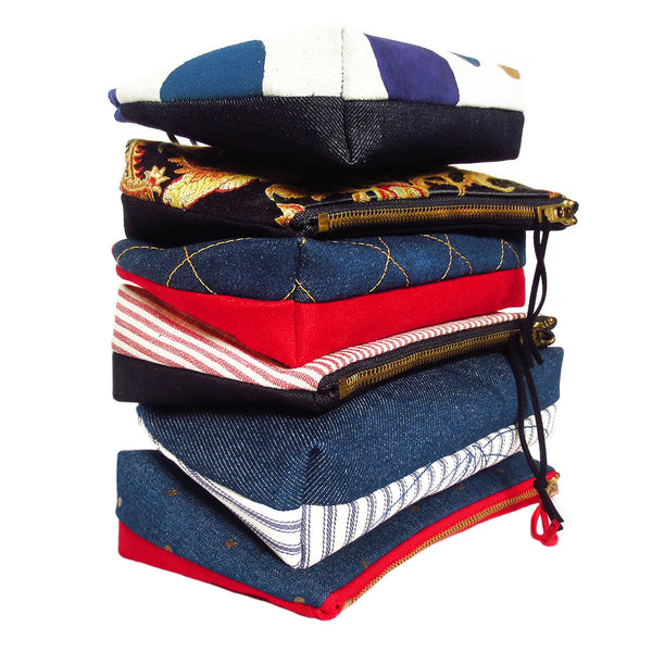 stack of small perfect pouches from Holland Cox
