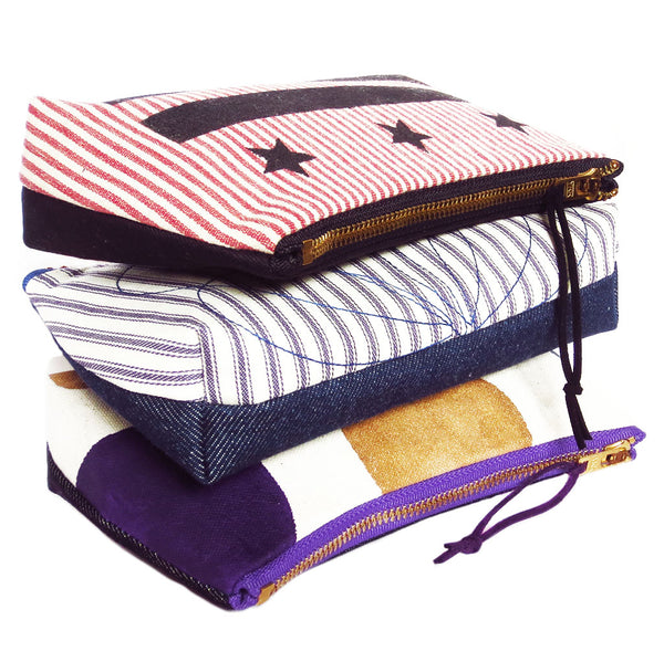 the stars and bars, persephone, and felicity small perfect pouches from Holland Cox