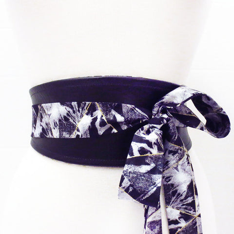 reversible wrap belt in black vinyl and black and gray cotton print, with long ties to tie in a knot or bow in front or back