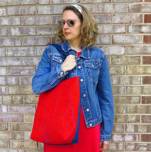 the persephone 517 tote on the shoulder of a model