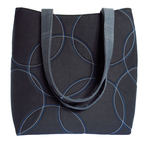 the sofia 517 tote with overlapping circles motif on black denim - from Holland Cox