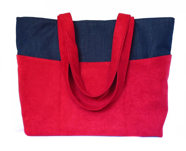 back view of the anjelica tote bag, in red ultrasuede and dark blue denim