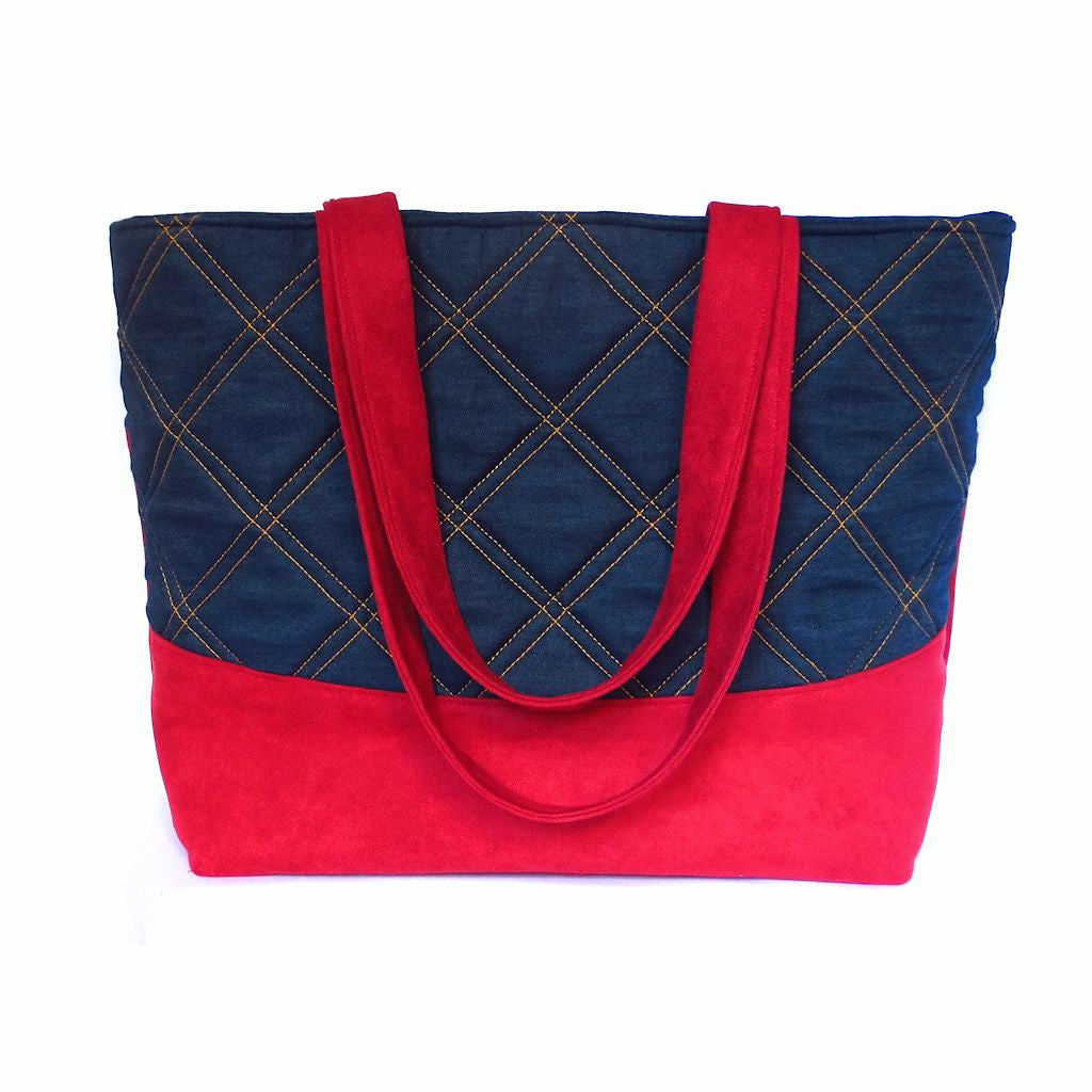 red ultra suede and denim tote, with windowpane check detail stitched in gold thread, from Holland Cox
