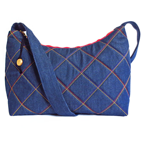 Denim handbag quilted in gold, purple and red from Holland Cox