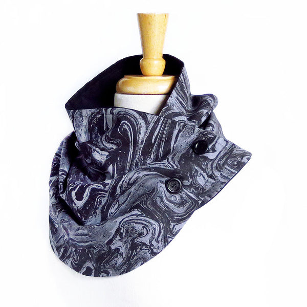 Fabric button scarf in black and gray marble print, lined in black linen, with two hand painted buttons in black. 