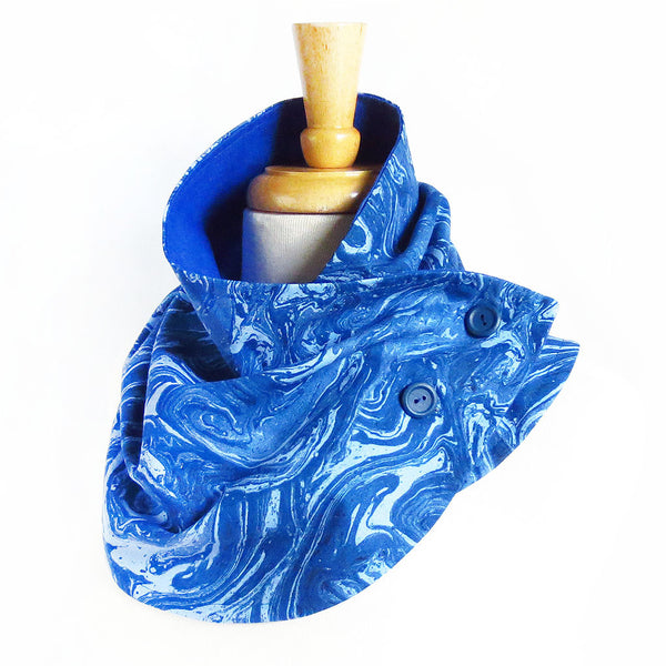 Fabric button scarf in blue marble print, lined in bright blue linen, with hand painted buttons in blue. 