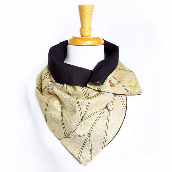 alternative way to wear the cassandra scarf, showing off the black lining and the pointed tips