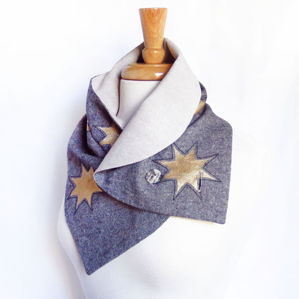the octavia button scarf from Holland Cox styled as a collar