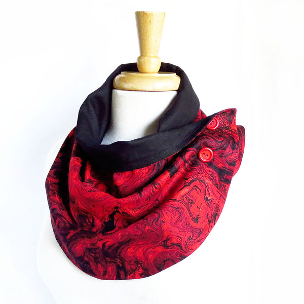 Fabric button scarf in red and black marble print, lined in black linen, with hand painted buttons in red.