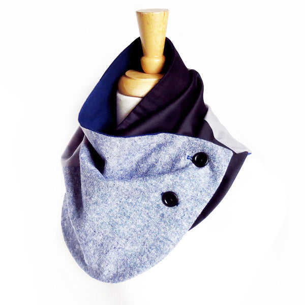 Modern patchwork fabric button scarf in blue, black, and gray. Lined in navy blue flannel with two hand painted buttons. 