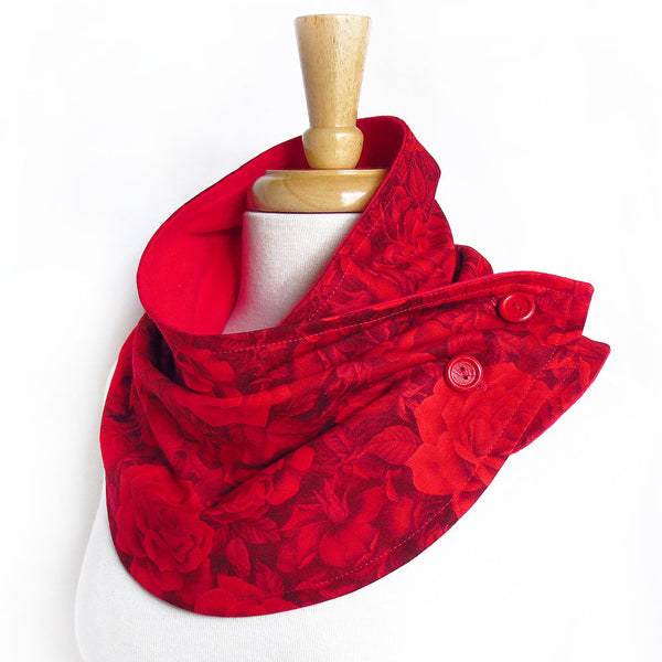 the rosetta button scarf is a tonal rose print in intense shades of dark red, with red painted buttons, and red flannel lining