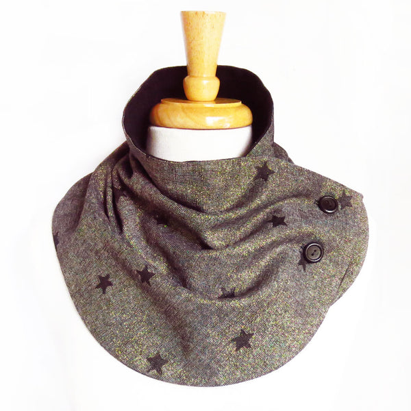 Fabric button scarf in metallic gold and black essex linen, hand painted with black stars, lined in black flannel with hand painted buttons in black.