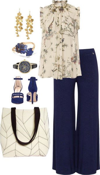 the cassandra 517 tote with navy pinstripe trousers and a floral blouse