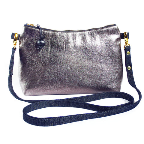 medium crossbody bag in pewter metallic leather and dark blue denim flecked with metallic thread. 