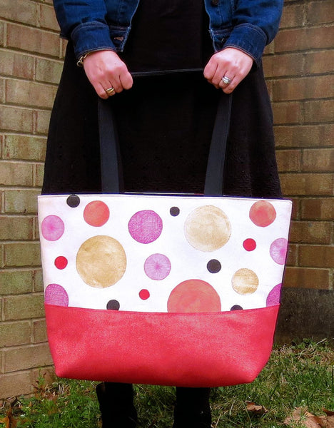 the felicity tote in the hands of a model