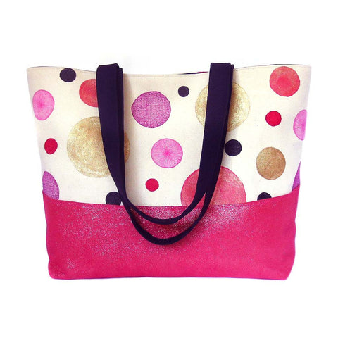 tote bag with hand drawn and painted polka dots in pink and gold with metallic pink leather accent