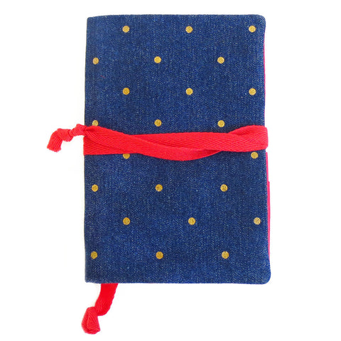 denim with gold polka dot field notes cover, lined in red with red bookmark and wrap tie