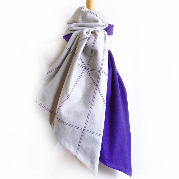 men's flannel scarf is stitched with abstract lines and lined with purple flannel
