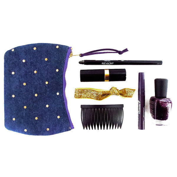 purple lola mini pouch shown with your everyday carry makeup
