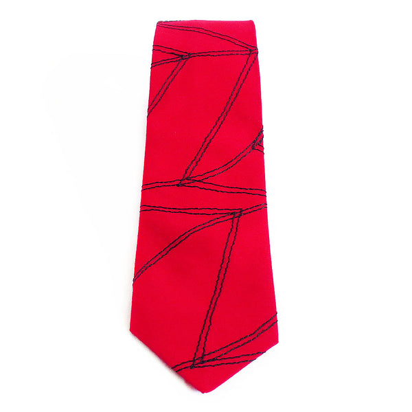 Cotton necktie in red, stitched with Holland Cox's signature chevron wave motif in black thread.