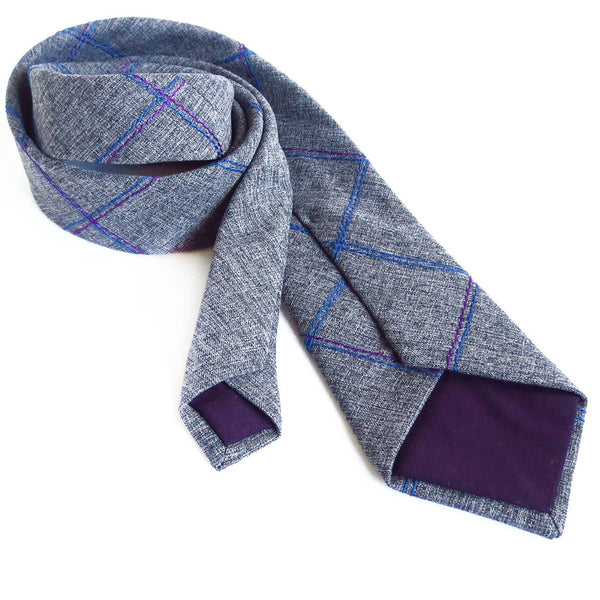 the kennedy necktie from Holland Cox is lined in purple