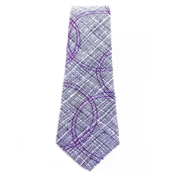 Cotton necktie in black and white print with purple circles stitched on top. 
