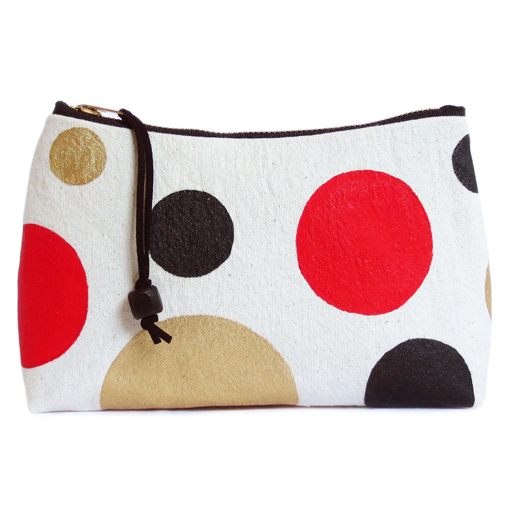 gold leather and painted polka dot canvas zip pouch, 7" brass zipper, black twill lining, black wooden bead pull