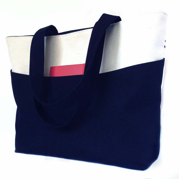back view of the regina tote, in black denim and natural canvas