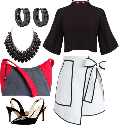 outfit idea for the sibyl everyday bag, featuring a black top and a black and white wrap skirt