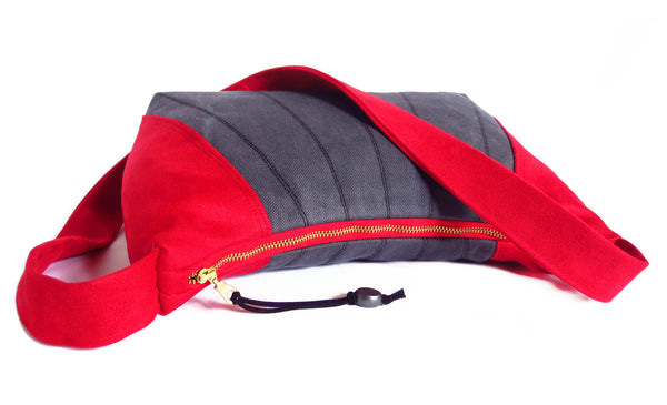 the sibyl bag closes with a 12" red zipper with brass teeth