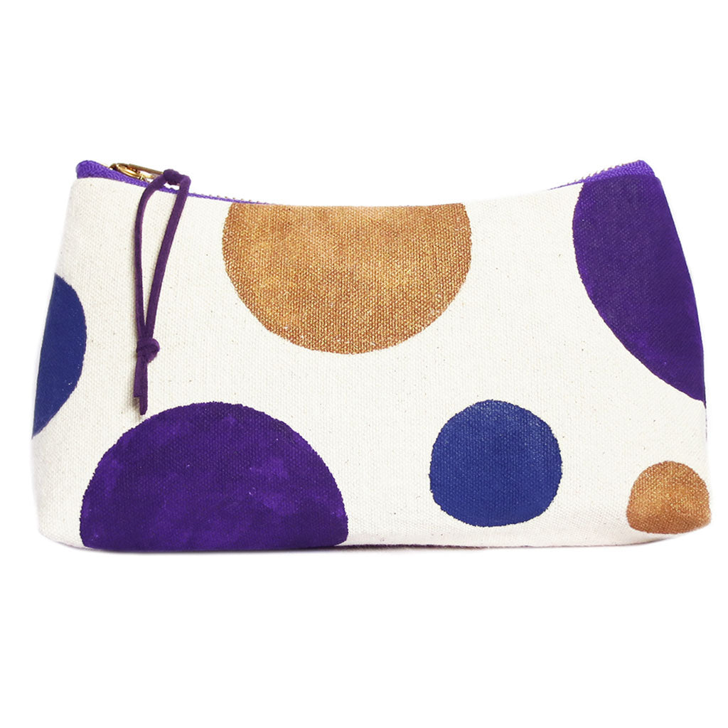 small zip pouch from Holland Cox hand painted with polka dots in gold, purple, and blue