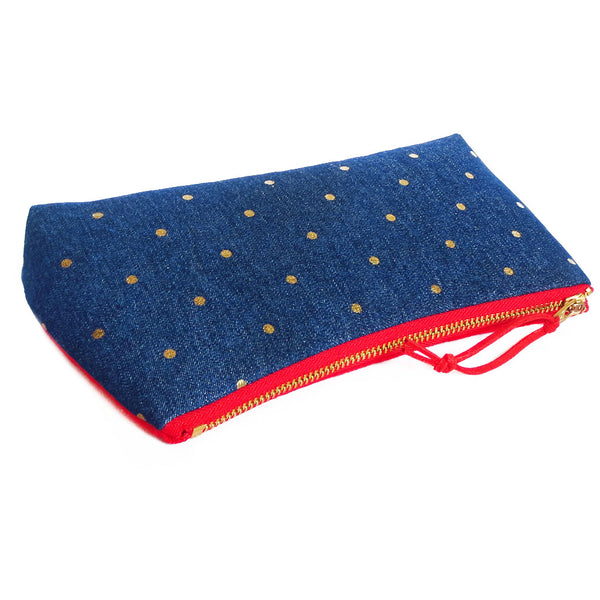 the small pouch closes with a 7" heavy duty brass zipper