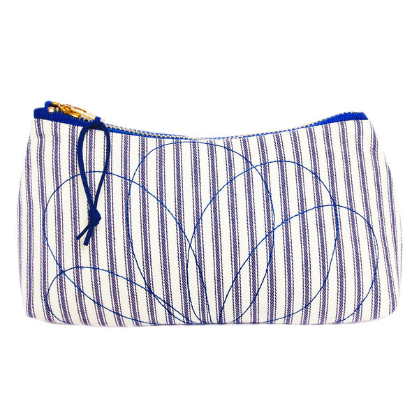 small zip pouch with petal motif stitched on blue and white ticking