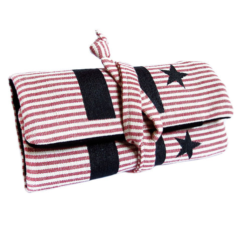 DC pride watch roll featuring the DC flag stenciled on red and white ticking